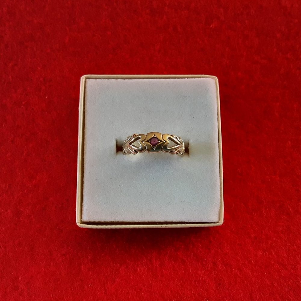 Gold and Ruby Ring With Heart Details